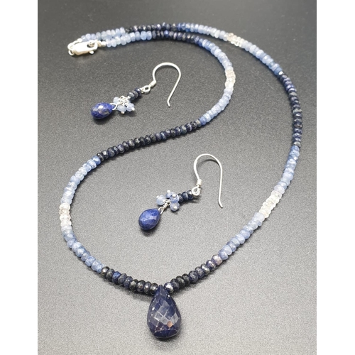 766 - A shaded Blue sapphire Necklace with a sapphire drop and matching dangler earrings. Necklace length ... 