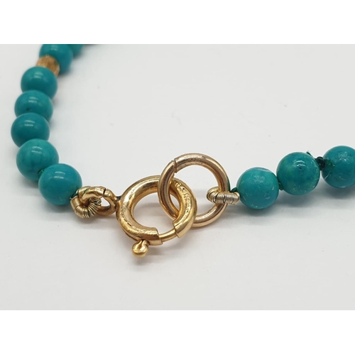 653 - Turquoise and 9ct Gold NECKLACE.    10g   40cm