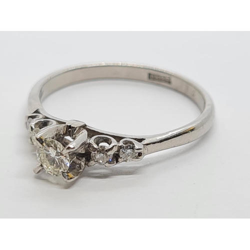 682 - 18ct White Gold and Diamond RING   3.4g  Size R