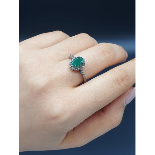 543 - 925 Silver Emerald Ring with a 1ct Emerald and 0.30ct Diamonds, weight 2.96g and size N