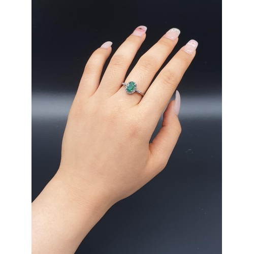 543 - 925 Silver Emerald Ring with a 1ct Emerald and 0.30ct Diamonds, weight 2.96g and size N