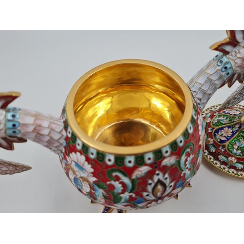 13 - An Antique Russian Silver and Enamel Sugar Bowl. Gilded and enamelled silver in the shape of two bir... 