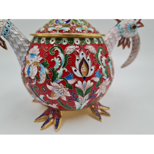 13 - An Antique Russian Silver and Enamel Sugar Bowl. Gilded and enamelled silver in the shape of two bir... 