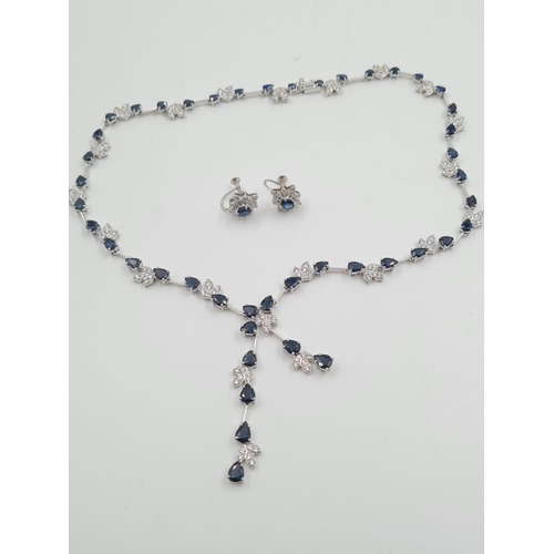 14 - An 18ct White Gold Sapphire and Diamond Necklace with Matching Earrings. Diamond weight 2.67 carats ... 