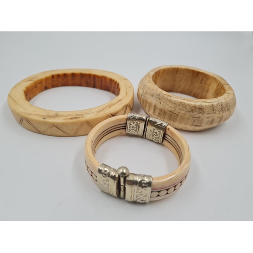 155 - 3 Antique African Ivory Bangles. Inner diameters of 9, 7 and 6cm.