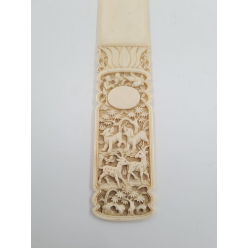 156 - An Antique 17th Century Ivory Letter Opener with hunting dogs and deer hand-carved decoration.
27cm ... 