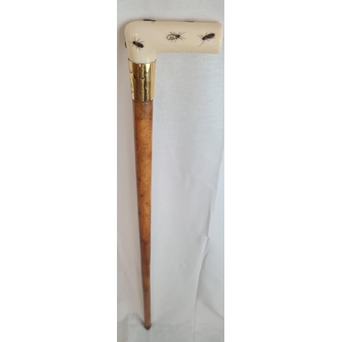 17 - AN ANTIQUE VICTORIAN WALKING STICK WITH CARVED IVORY HANDLE AND 18CT GOLD BAND.
92CMS IN HEIGHT