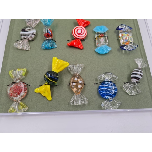 196 - An impressive collection of 15, very realistic, Murano, individually handmade, glass sweets.