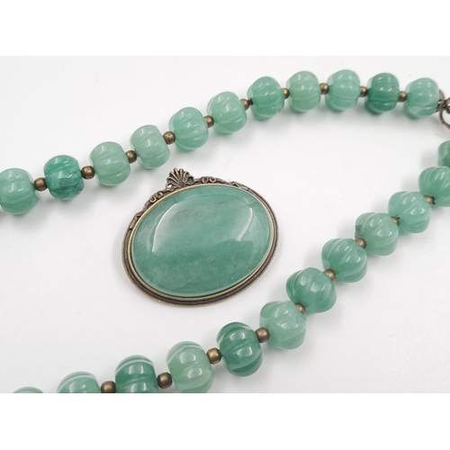 445 - A Beautiful Set of Jade Jewellery. Including a 44cm, 30 piece necklace. A 4cm Brooch and a pair of 3... 