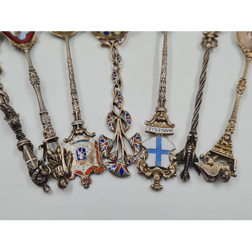 454 - Seven Vintage Enamel Decorative Spoons. All with Ornate stems and handles. Good condition. 13cm