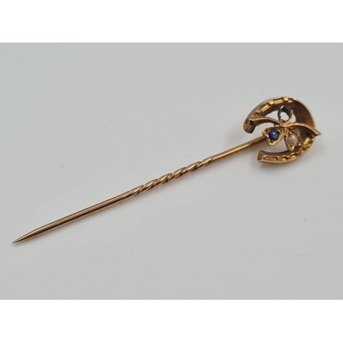 474 - A Vintage 9ct Gold Stickpin with Horseshoe Charm. 5cm
1.3g. Original box.