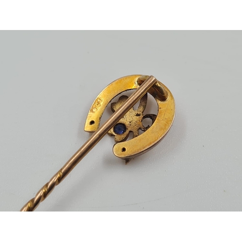 474 - A Vintage 9ct Gold Stickpin with Horseshoe Charm. 5cm
1.3g. Original box.