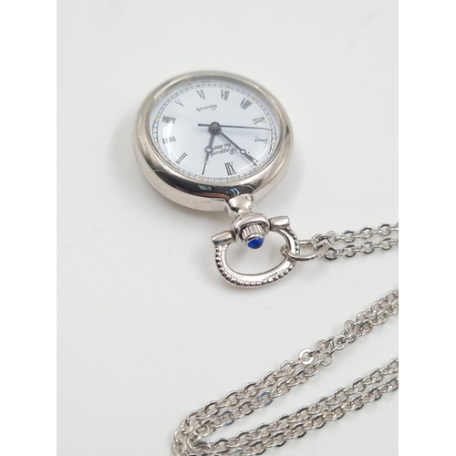 478 - A Rapport Quartz Pendant watch on a White Metal Chain. 68cm. Comes with box.