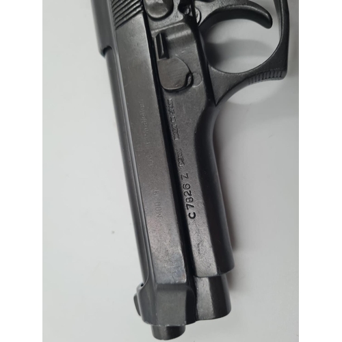 528 - An Automatic REPLICA Beretta Pistol. Cocking and dry firing action, with removable magazine (will ac... 