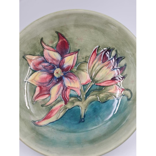 691 - A Beautiful Vintage Moorcroft Fruit bowl. Decorative Floral Design on a lustrous Green Glaze.
24cm d... 