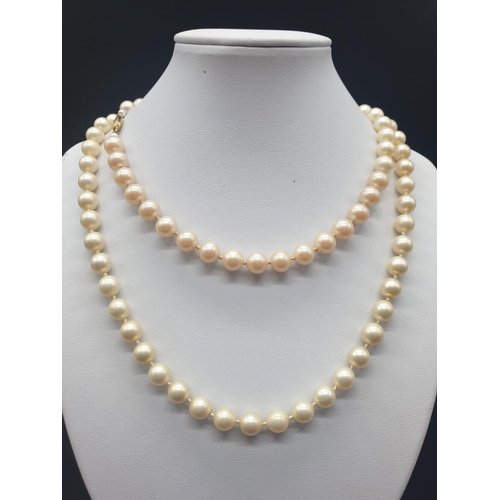 162 - A Belle Epoque Majorca pearl necklace with a 14 carat clasp, on multi silk string with individually ... 