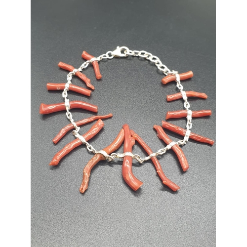 190 - A very elegant, sterling silver (stamped 925) and Mediterranean red coral bracelet and earrings set ... 