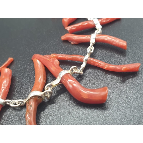 190 - A very elegant, sterling silver (stamped 925) and Mediterranean red coral bracelet and earrings set ... 