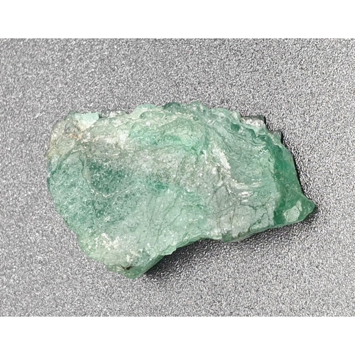 232 - 27.69Cts Natural Rough Emerald. IDT certified