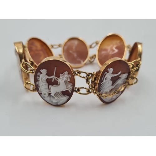 483 - A Cameo Jewellery Set, comprising of a bracelet (16cm), 2 brooches and 3 rings (L,N and Q). 2g 9ct G... 