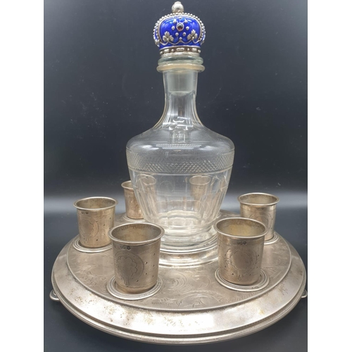103 - AN ANTIQUE RUSSIAN SILVER AND ENAMEL VODKA SET COMPRISING  OF A SILVER TRAY, 6 SILVER SHOT CUPS AND ... 