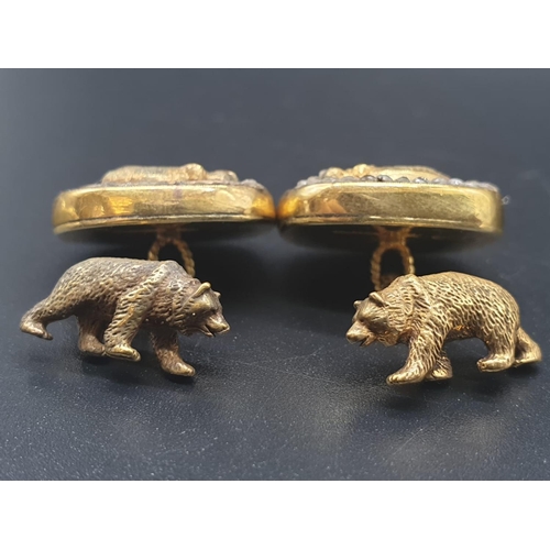 107 - A PAIR OF SILVER WITH ENAMEL AND DIAMOND RUSSIAN CUFFLINKS DEPICTING AN ELEPHANT AND BEAR