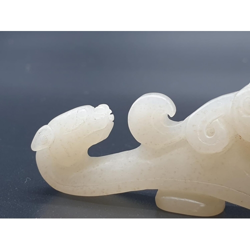 199 - CHINESE JADE FIGURINE OF A DRAGON . 44.1 gms and 8 cms IN LENGTH