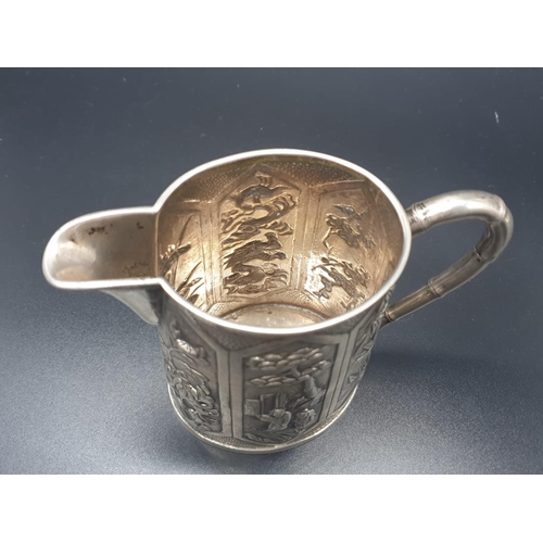 45 - A WANG HING ANTIQUE SET OF 3 HAND ENGRAVED ITEMS TO INCLUDE 2 JUGS AND A BOWL WITH TRADITIONAL CHINE... 