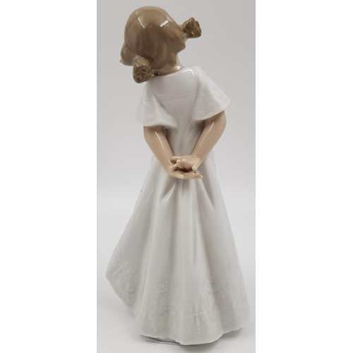 442 - A Nao by Lladro Porcelain Figure. Shy Little Daisy. 20cm tall.