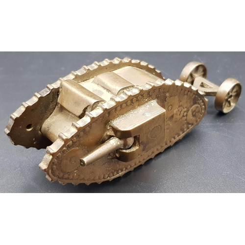 876 - WW1 Trench-Art Brass Tank. Duel Movable Guns. Wheels on rear, 13 x 3cm.