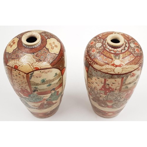 342 - A PAIR OF HAND PAINTED VASES WITH CHINESE CHARACTERS ON THE BASE . HEIGHT 15cms