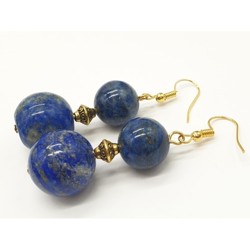 648 - A quality lapis lazuli necklace and earrings set in a presentation box. Necklace length: 49-53cm, ea... 