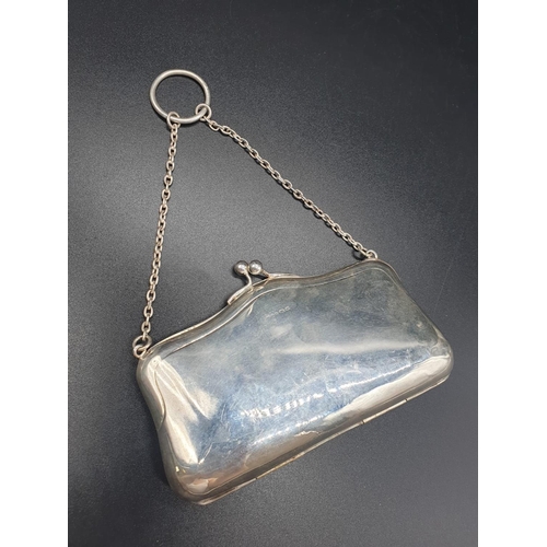 792 - An early white-metal elegant purse. Attached to a white-metal chain with cloth interior. 12 x 8cm. 1... 