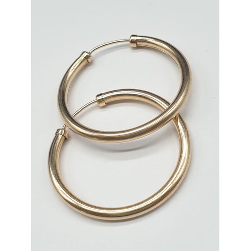 800 - 9ct yellow gold hoop earrings.