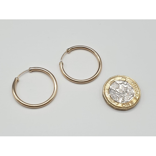 800 - 9ct yellow gold hoop earrings.