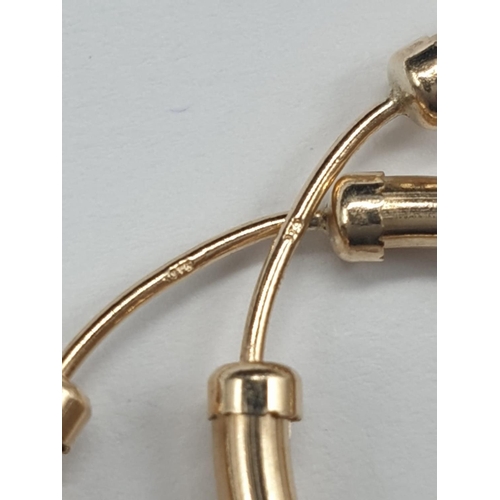 800 - 9ct yellow gold hoop earrings.