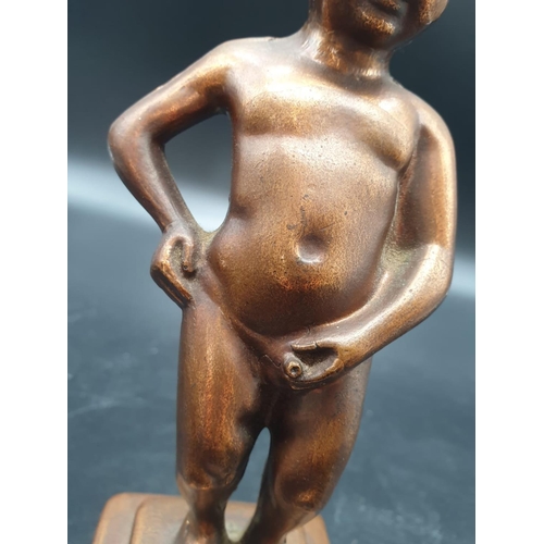 832 - A metal souvenir statue of the famous Peeing Boy of Brussels. 21cm