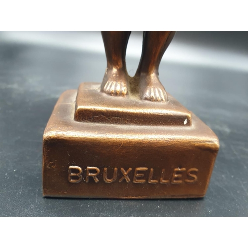 832 - A metal souvenir statue of the famous Peeing Boy of Brussels. 21cm