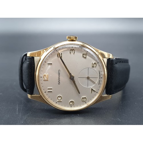 294 - A gents GARRARD watch, 35mm, with gilded bezel and back and “Mr Choyce