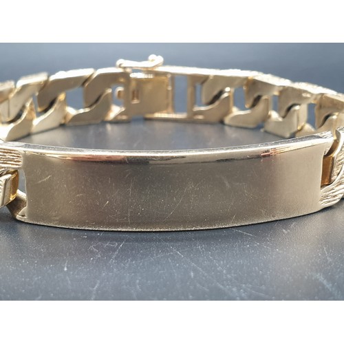 97 - A 9 carat, fully hallmarked, gents ID bracelet, with bark effect chain. Length: 23cm, weight: 54g.