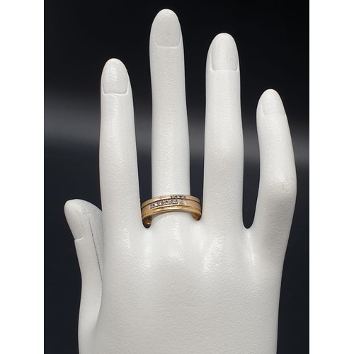 168 - A 9 carat, yellow gold and diamonds ring. Ring size: S, weight: 5g.