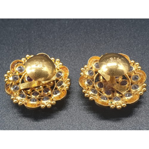 273 - A pair of 22 carat yellow gold earrings with clear and red stones (untested). Total weight: 6g.