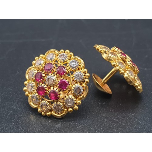 273 - A pair of 22 carat yellow gold earrings with clear and red stones (untested). Total weight: 6g.