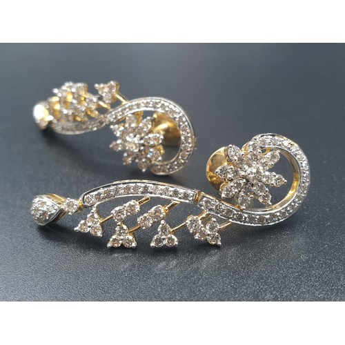 161 - A fabulous 18 carat gold and diamonds pair of earrings. Earrings length: 4cm. Total weight: 10g.