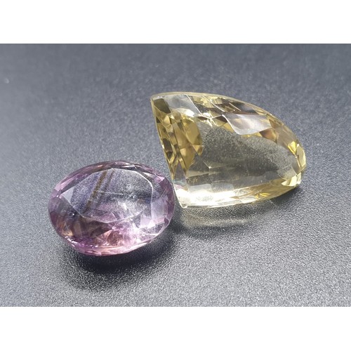 495 - A collection of two gemstones - fancy citrine 17.78cts and Amethyst 9.30cts with certificates