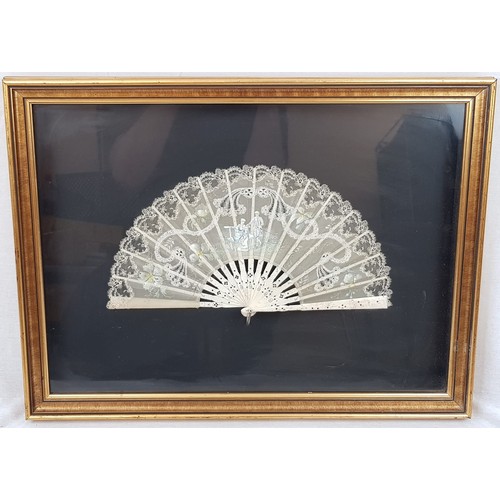 298 - AN ANTIQUE IVORY AND VENETIAN LACE FAN WITH MINIATURE PAINTING AND FRAMED.
60 X 45cms