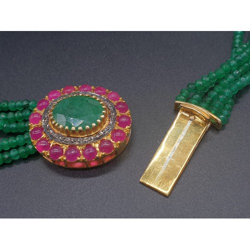 152 - A Five Row Green Onyx necklace with a Ruby clasp cum brooch with a halo of diamonds and rubies , 22 ... 