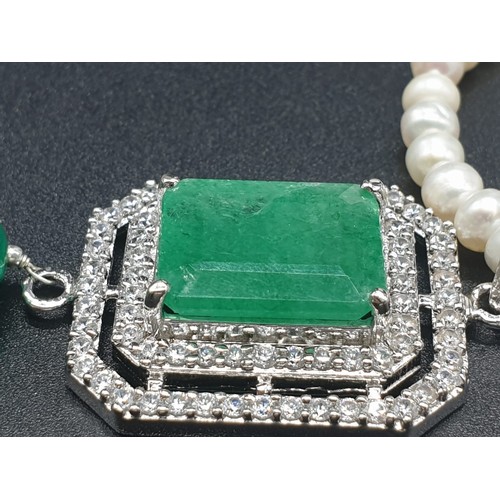 361 - Two row freshwater Pearl Necklace with emerald pendant , with emerald approx 10cts, 18 inches length