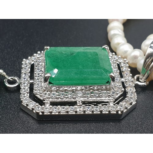 361 - Two row freshwater Pearl Necklace with emerald pendant , with emerald approx 10cts, 18 inches length