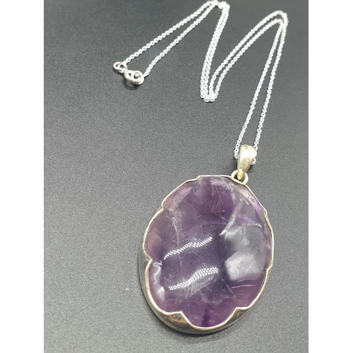 516 - 45cts Amethyst Gemstone pendant in sterling silver with chain